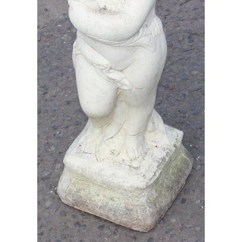 305 - A white painted concrete garden birdbath formed as a cherub, approx 88cm tall