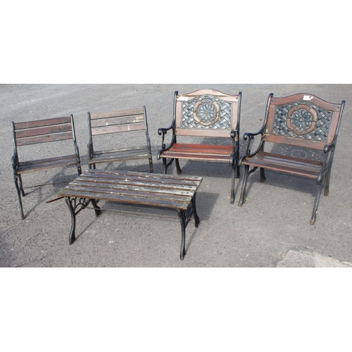 308 - 4 cast iron and wooden garden chairs and a cast iron and wooden garden table (5)