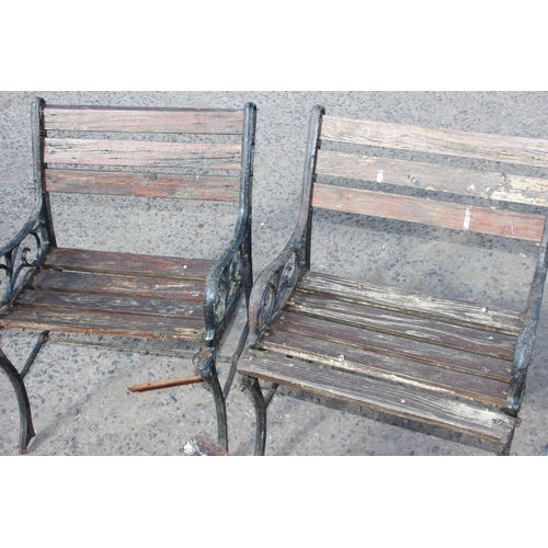 308 - 4 cast iron and wooden garden chairs and a cast iron and wooden garden table (5)