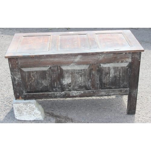 51 - An 18th century oak coffer with carved details, approx 120cm wide x 54cm deep x 71cm tall