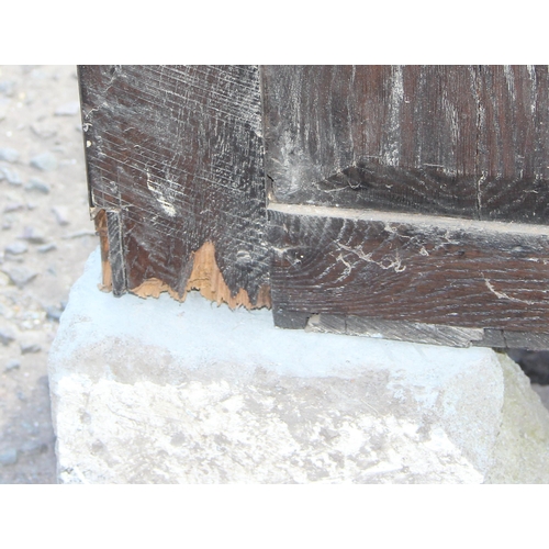 51 - An 18th century oak coffer with carved details, approx 120cm wide x 54cm deep x 71cm tall