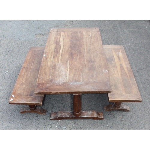 53 - A hardwood dining table and 2 matching benches, approx 180cm wide x 93cm deep x 75cm tall