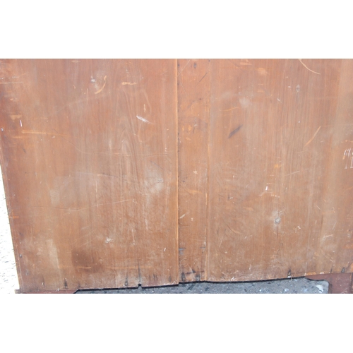 54 - An antique mahogany 2 over 3 chest of drawers with brass handles, approx 113cm wide x 58cm deep x 10... 