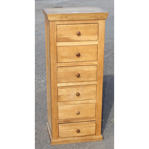 61 - A good quality modern light oak 6 drawer low chest of drawers, approx 54cm wide x 42cm deep x 127cm ... 