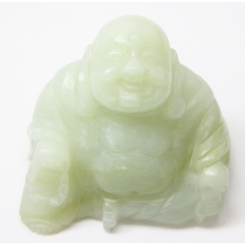 1607 - A small Chinese jade carving of a seated Buddha with beads, approx 55mm wide x 50mm tall