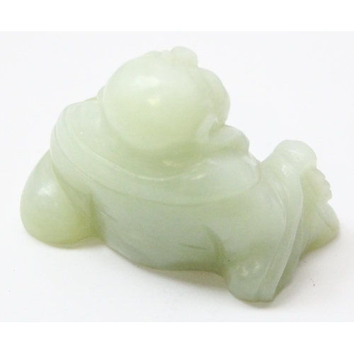 1607 - A small Chinese jade carving of a seated Buddha with beads, approx 55mm wide x 50mm tall