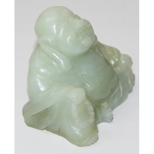 1607 - A small Chinese jade carving of a seated Buddha with beads, approx 55mm wide x 50mm tall