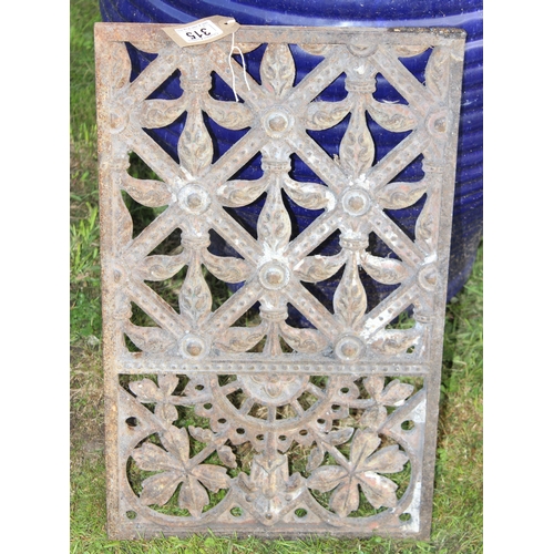 315 - A decorative antique cast iron grill, approx 54cm x 34cm