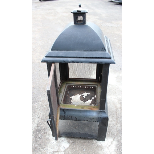 316 - A black metal fire pit or garden brazier, approx 136cm tall x 62cm square