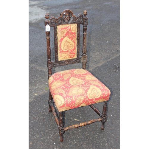 76 - A Carolean style carved oak hall chair with upholstered seat and back, likely 19th century