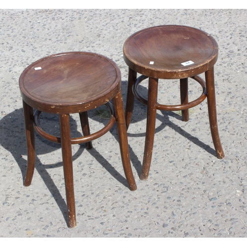 84 - A pair of Thonet style bentwood stools, each approx 33cm in diameter x 48cm tall