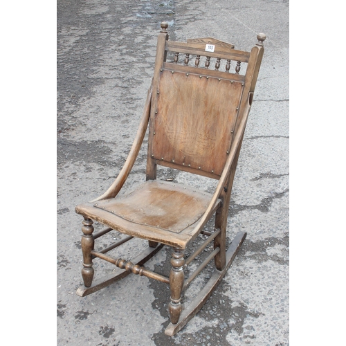 103 - An Art Nouveau period wooden rocking chair with bentwood seat and back