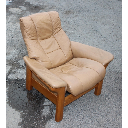 112 - A retro Ekornes Stressless 2 seater reclining sofa and 2 armchairs, in tan leather, sofa approx 150c... 
