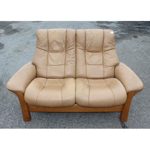 112 - A retro Ekornes Stressless 2 seater reclining sofa and 2 armchairs, in tan leather, sofa approx 150c... 