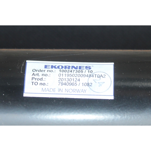 112 - A retro Ekornes Stressless 2 seater reclining sofa and 2 armchairs, in tan leather, sofa approx 150c... 