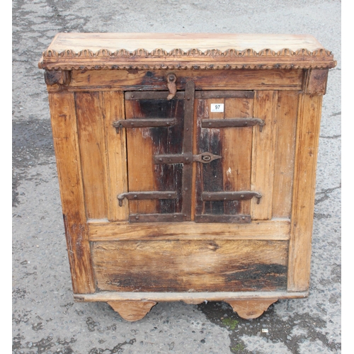 97 - An unusual Oriental hardwood dowry cabinet on wheels, similar in type to a Japanese Kuruma Dansu cab... 