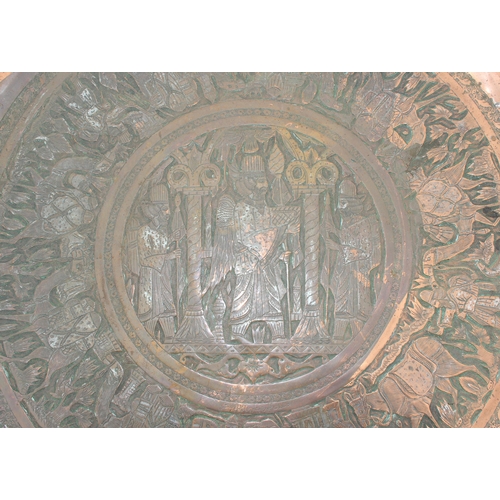 99 - An unusual brass tray table with circular brass Benares tray in bespoke made wooden table, approx 92... 