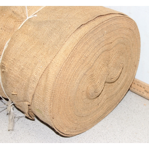 200 - A large roll of vintage upholstery hessian