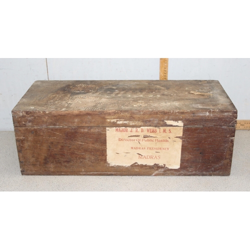 277 - A vintage wooden trunk bearing label for 