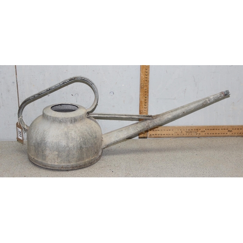 311 - An unusual vintage galvanised watering can