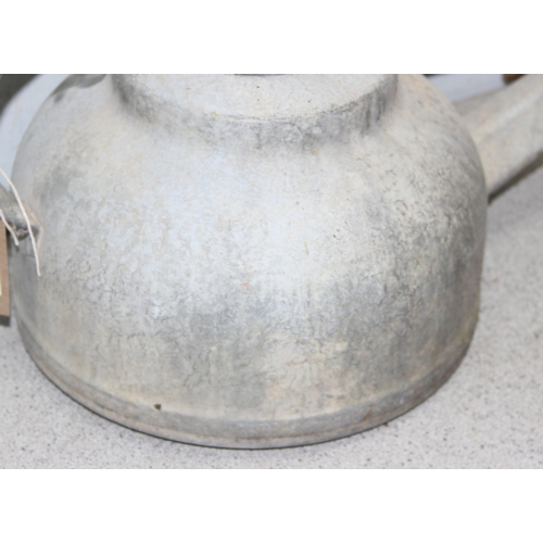 311 - An unusual vintage galvanised watering can