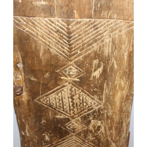 68 - A Batonka People of the Zambezi or Binga Valley tribal carved heavy wooden hut door with geometric c... 