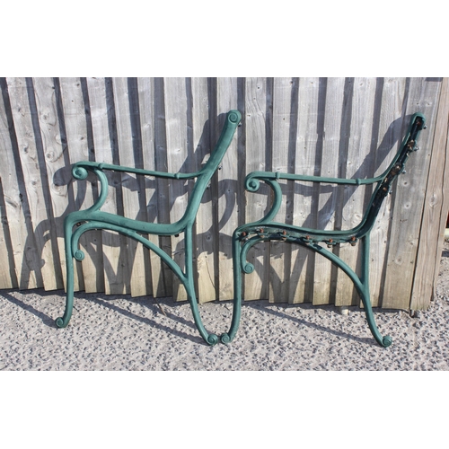 351 - A pair of cast iron bench ends, approx 47cm wide x 80cm tall