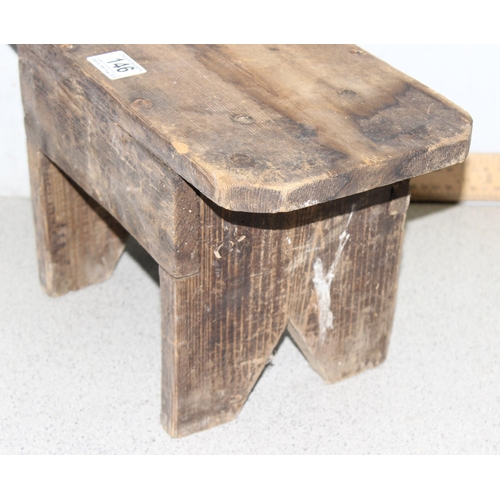 146 - A small rustic pine milking stool, approx 38cm wide