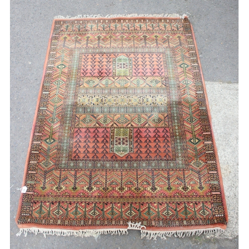 208 - A vintage Hadchlou wool rug, with labels, approx 230cm x 158cm