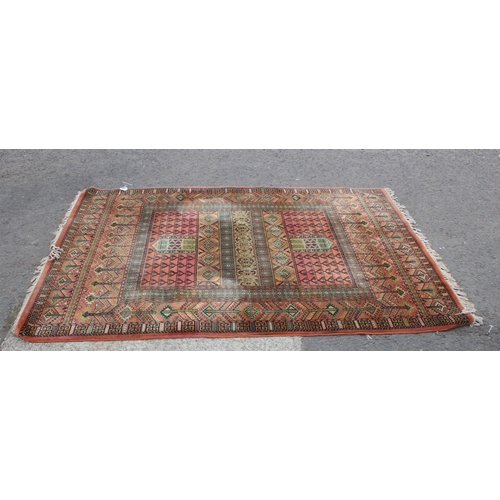 208 - A vintage Hadchlou wool rug, with labels, approx 230cm x 158cm