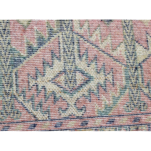 208 - A vintage Hadchlou wool rug, with labels, approx 230cm x 158cm