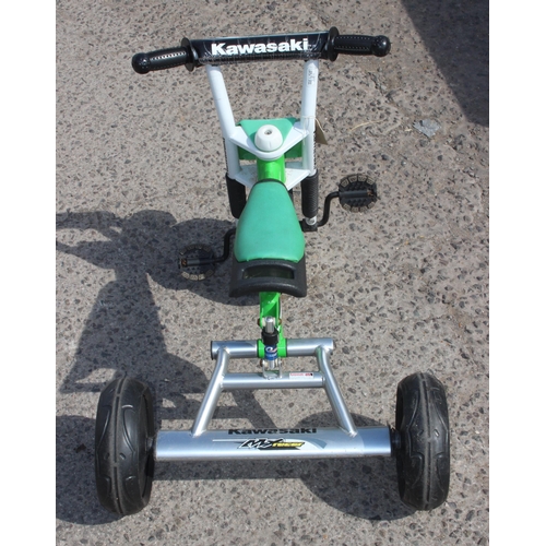 712 - Childs Kawasaki welded steel framed tricycle with rear suspension mechanism and 10 inch rubber wheel... 