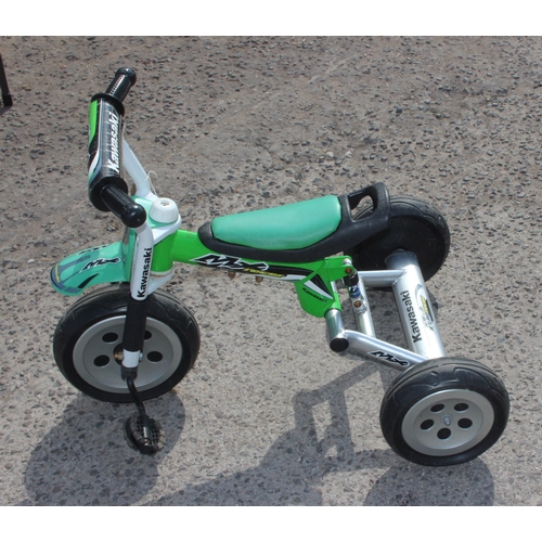 712 - Childs Kawasaki welded steel framed tricycle with rear suspension mechanism and 10 inch rubber wheel... 