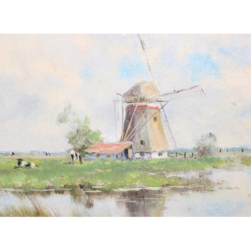 492 - Framed oil on canvas of a Dutch windmill, unsigned with framers label to verso approx 29cm x 24cm