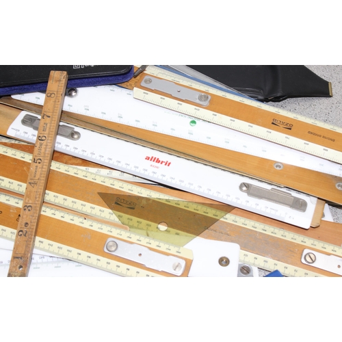 667 - Large box of Geometry items to include a large number of rulers