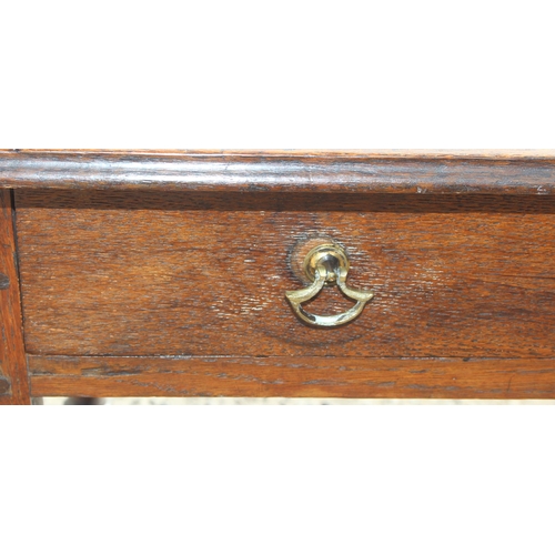 124 - An antique oak console table with single drawer and turned legs, approx 87cm wide x 61cm deep x 72cm... 