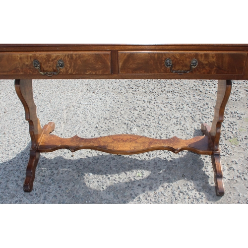 125 - A vintage walnut drop flap sofa table with 2 drawers, approx 147cm wide x 59cm deep x 75cm tall