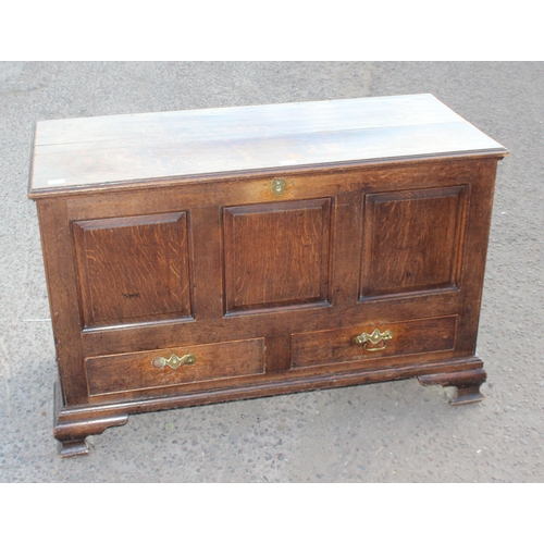 126 - An antique oak mule chest or coffer with 2 drawers, approx 118cm wide x 52cm deep x 77cm tall