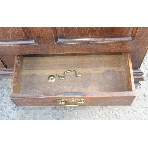 126 - An antique oak mule chest or coffer with 2 drawers, approx 118cm wide x 52cm deep x 77cm tall