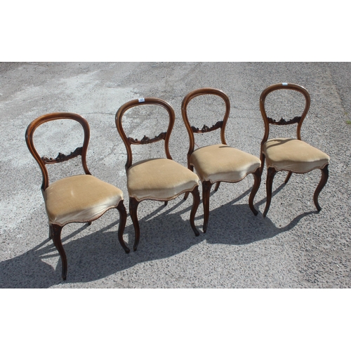 127 - A set of 4 Victorian balloon back dining chairs with stuffed seats