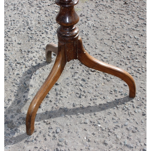 130 - A small antique mahogany tilt top table with tripod base, approx 62cm wide x 41cm deep x 77cm tall