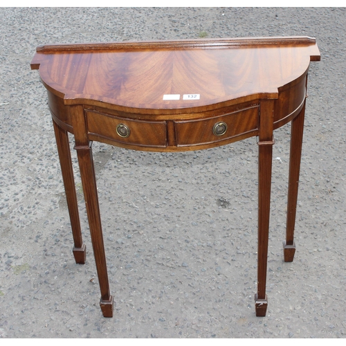 132 - An antique style mahogany hall table with 2 drawers, approx 75cm wide x 36cm deep x 75cm tall