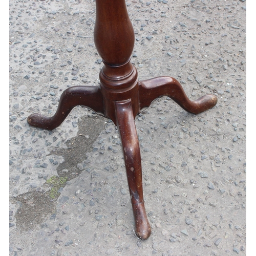 133 - Antique mahogany tilt top table with tripod base, approx 50cm in diameter x 74cm tall