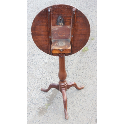 133 - Antique mahogany tilt top table with tripod base, approx 50cm in diameter x 74cm tall