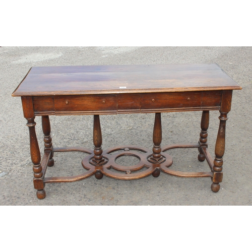 142 - A 17th century style oak side table with 2 main drawers and smaller middle hidden drawer. An unusual... 