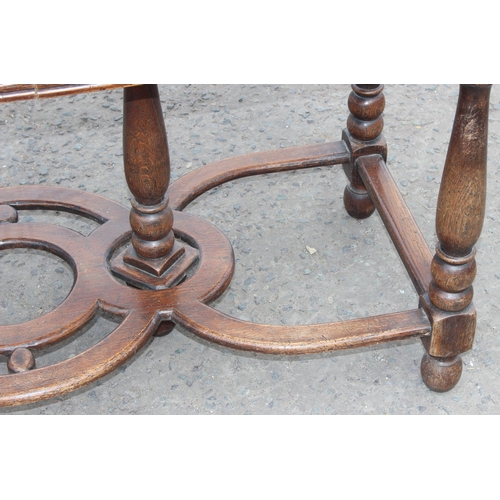 142 - A 17th century style oak side table with 2 main drawers and smaller middle hidden drawer. An unusual... 