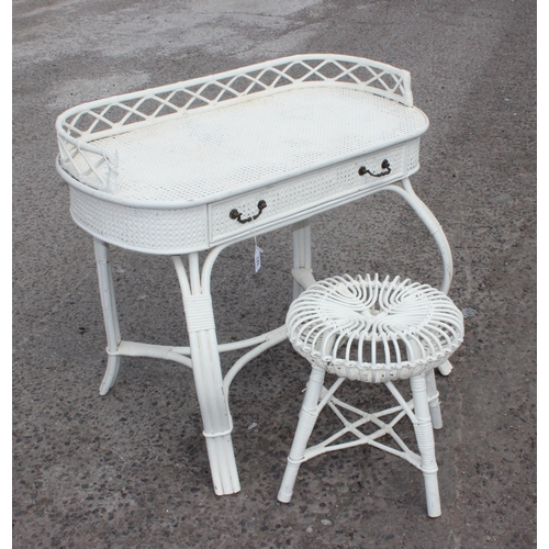 143 - A retro white painted bamboo and rattan desk with drawer and a white painted bamboo stool likely by ... 