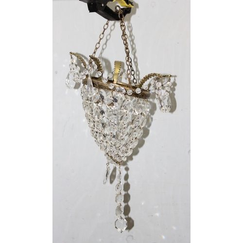 244 - 2 gilt-brass crystal chandeliers of different forms