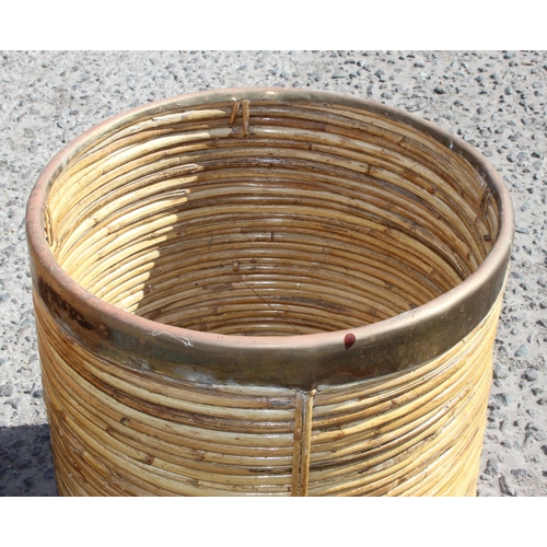 286 - 2 vintage bentwood baskets with brass edging, the largest approx 50cm tall