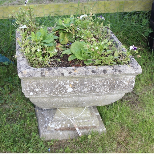 334 - A vintage weathered concrete garden pot with plants, approx 53cm square x 45cm tall, in 2 parts